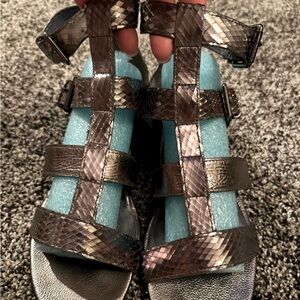 Kenneth Cole gladiator sandals.